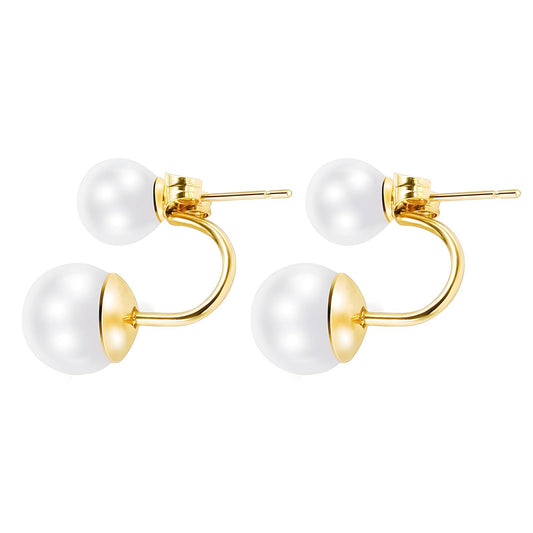 Pair of gold hoop earrings with white pearls on a white background