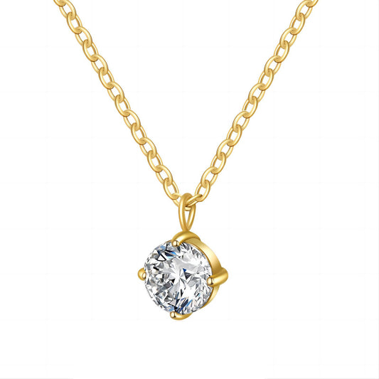 Gold necklace with acubic zirconia stone pendant on a white background