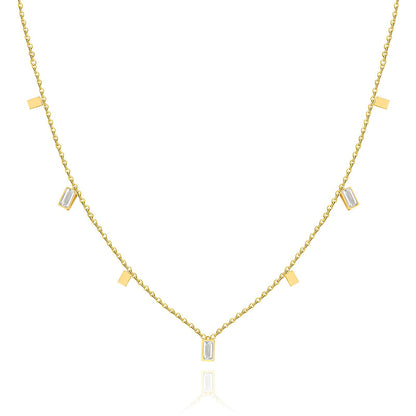 Gold necklace with rectangular  Cubic zirconia stones on a white background