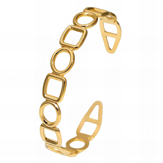 Gold Bangle bracelet with geometric design on a white background