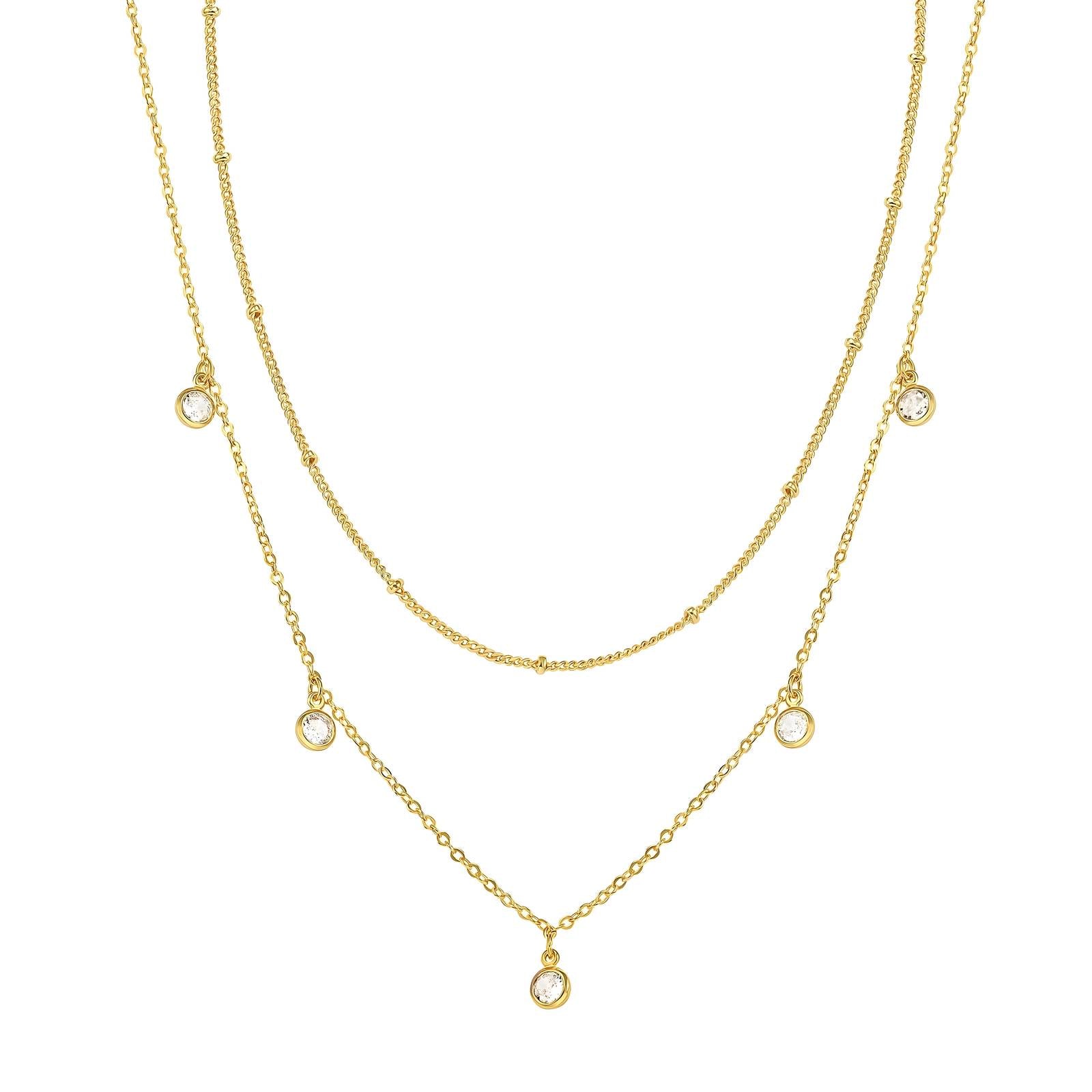 Dual gold layer necklaces on a white background