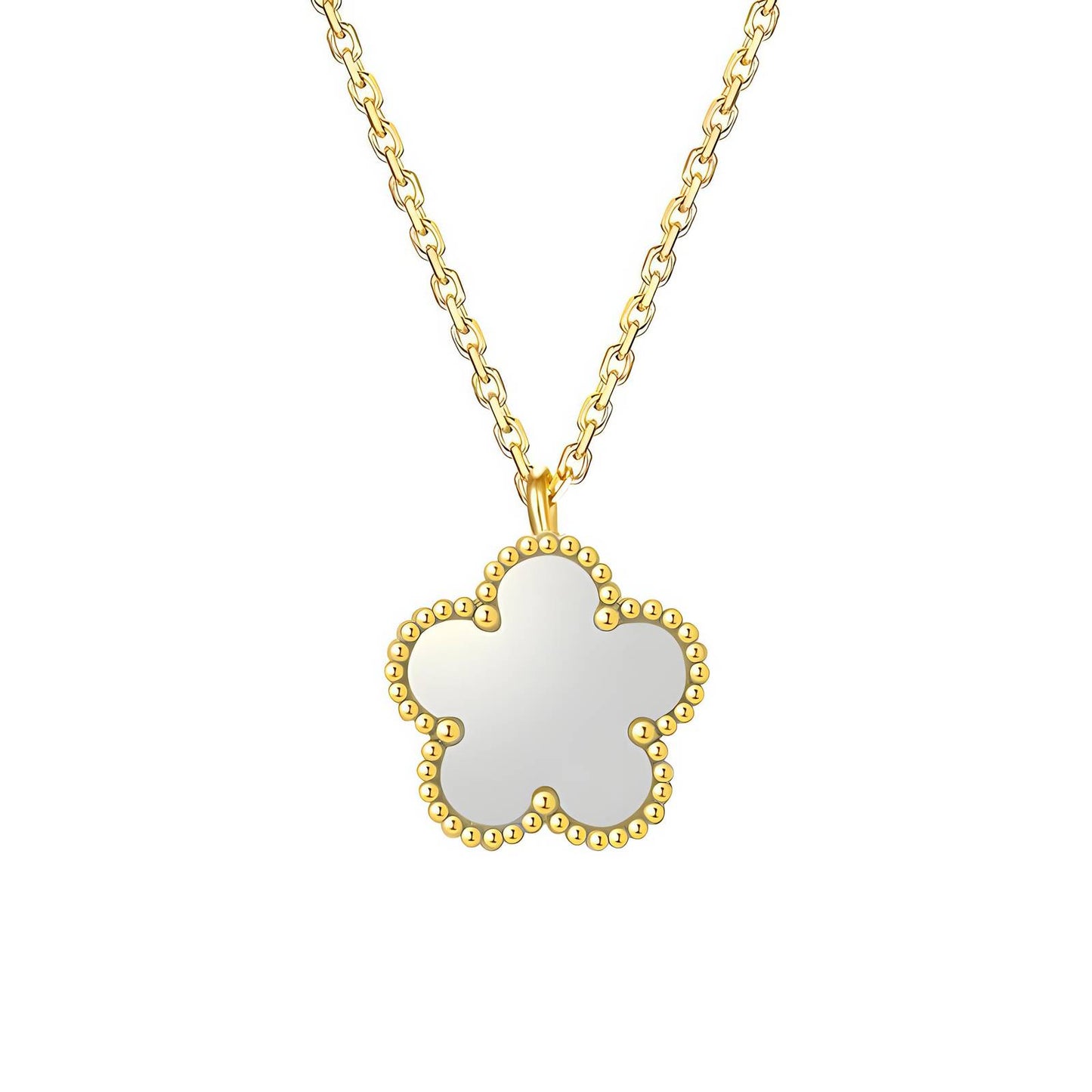Gold necklace with a white pendant on a white background