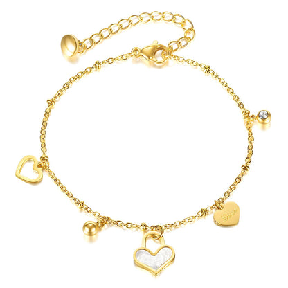Gold bracelet with heart-shaped charms on a white background