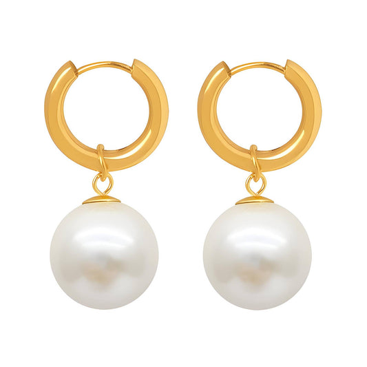 Gold hoop earrings with white pearls on a white background